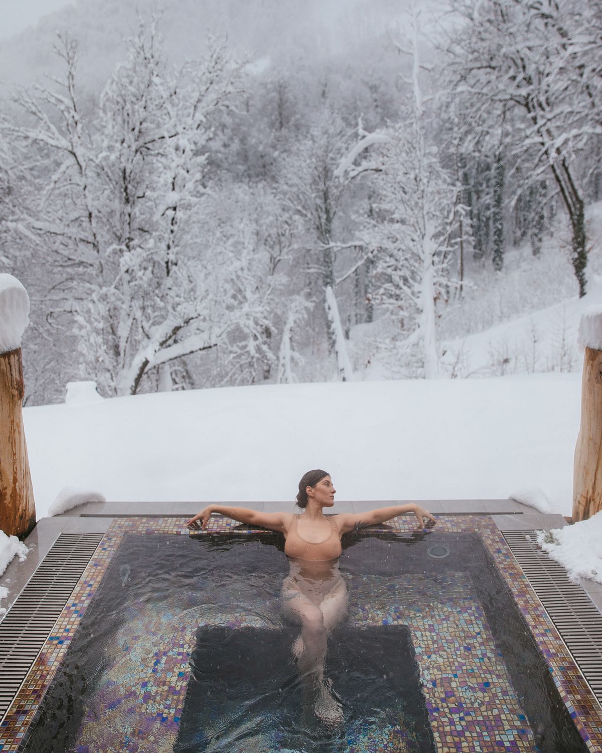 The hot pool at 38°C surrounded by snow