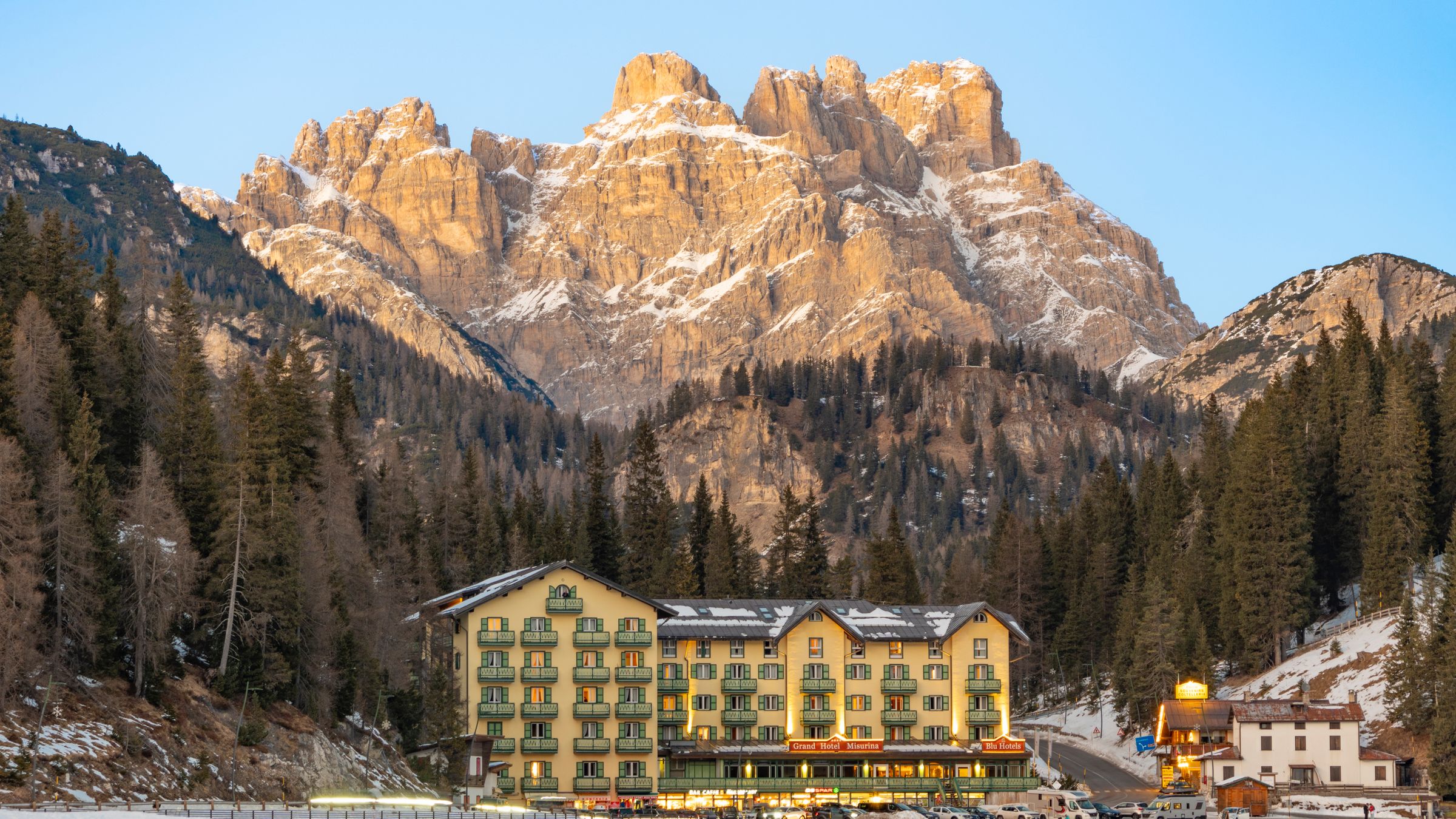 Aurelia house beneath the Dolomites at golden hour