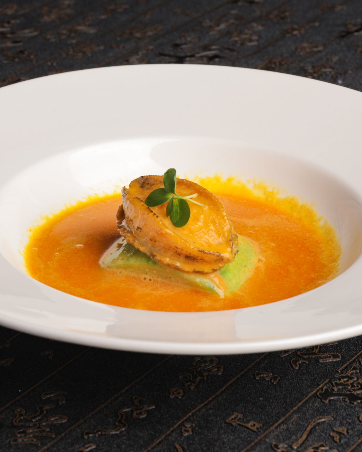 Char in a citrus broth
