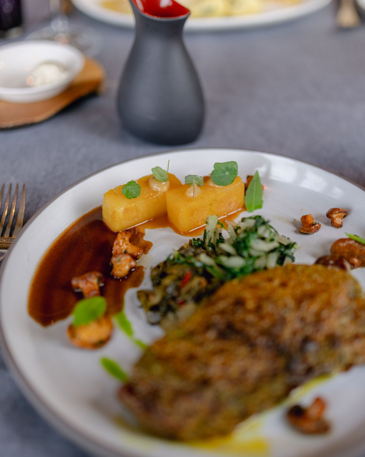 Seasonal plate with sauce and greens