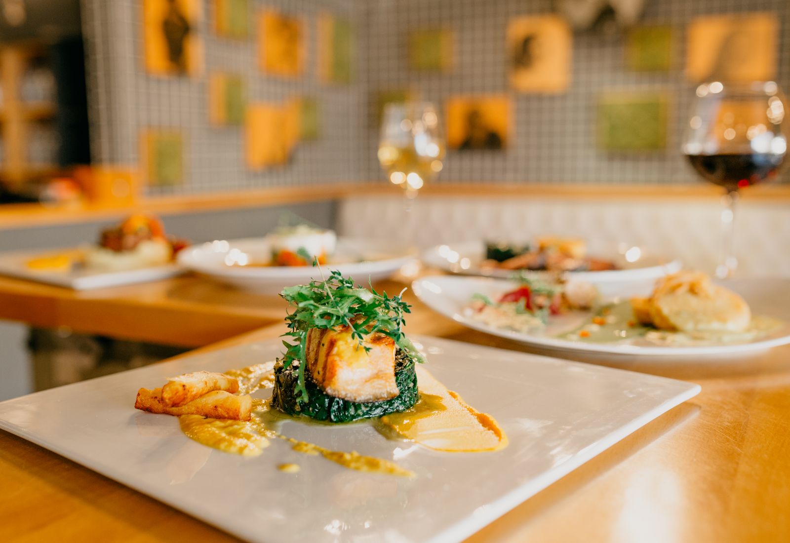 Plates and wine at the long table